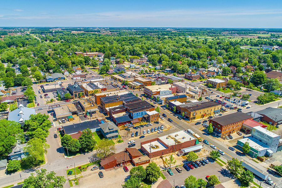 Contact - Small Town Aerial View of in Indiana on a Sunny Summer Day