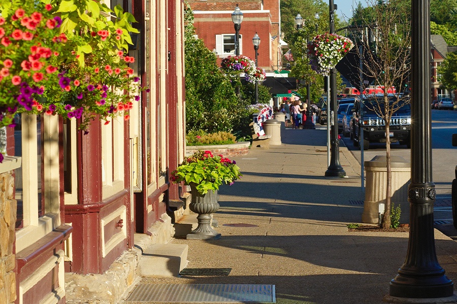 Fortville, IN - Colorful Sidewalk View of Local Stores in Indiana Small Town